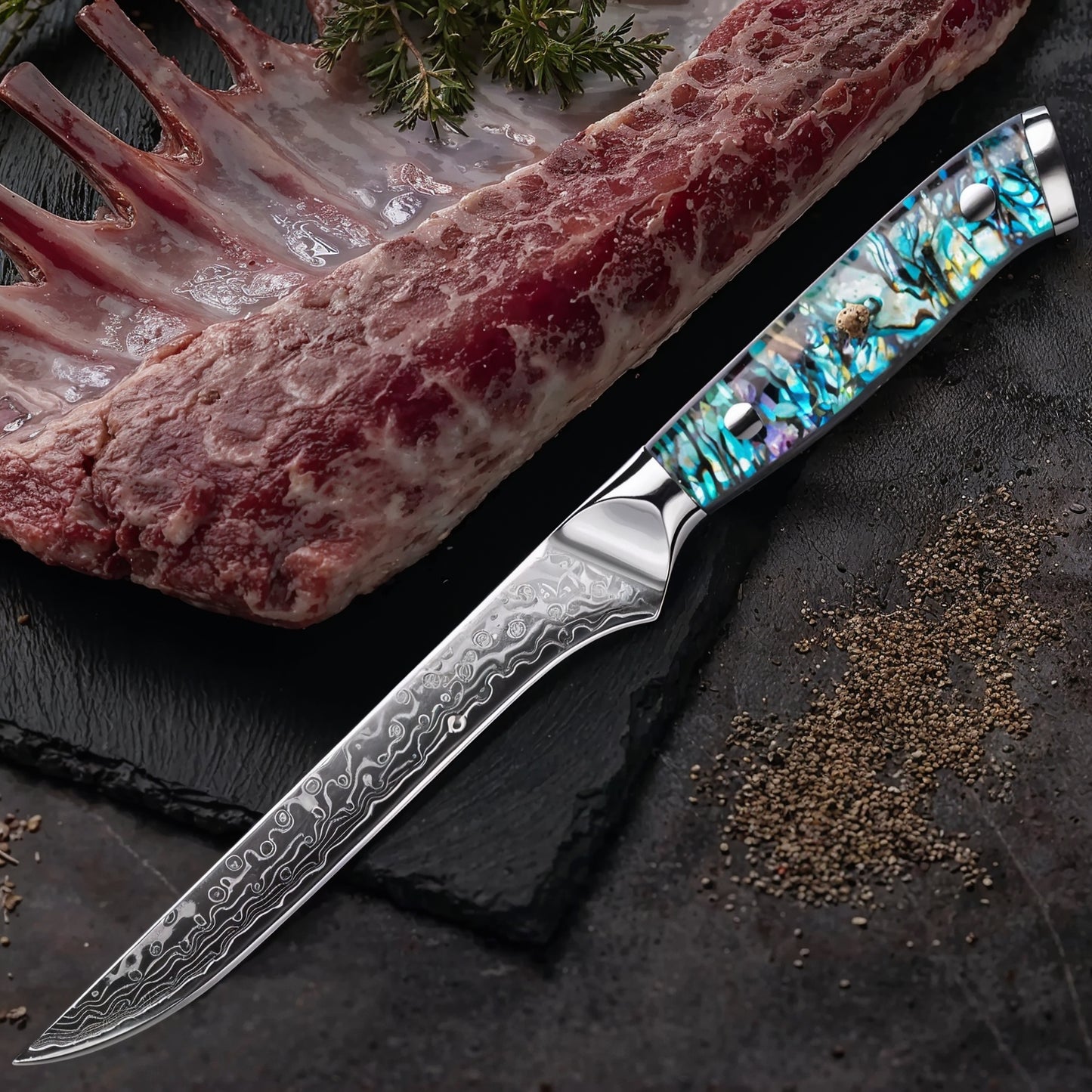 Couteau japonais damas manche en coquille d’ormeau